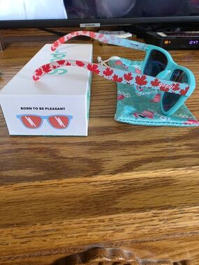 Goodr Turquoise Sunglasses with Red Maple Leaf Arms "Born To Be Pleasant"